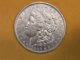 ** KEY GRADE! 1886-O Morgan Dollar in About Uncirculated plus