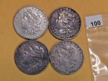 Four mixed Morgan Silver Dollars