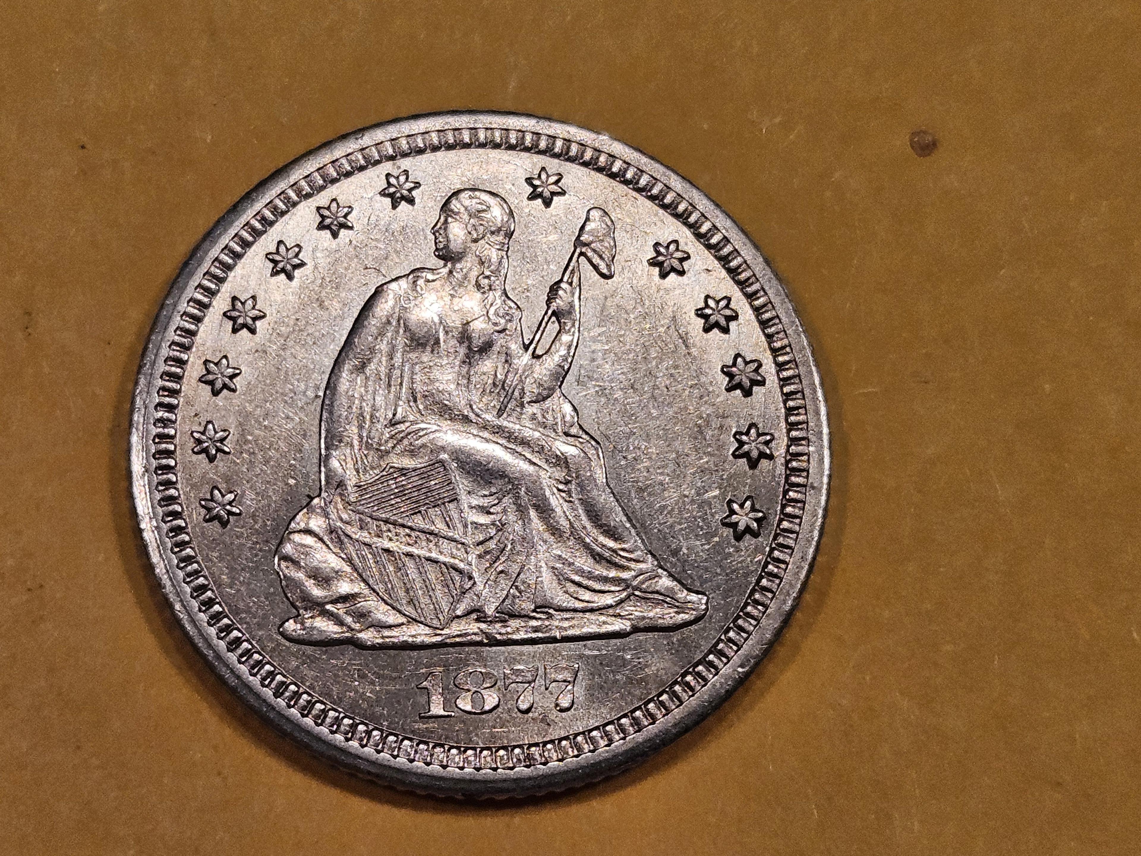 * NICE! 1877-CC Seated Liberty Quarter in Brilliant About Uncirculated - 58