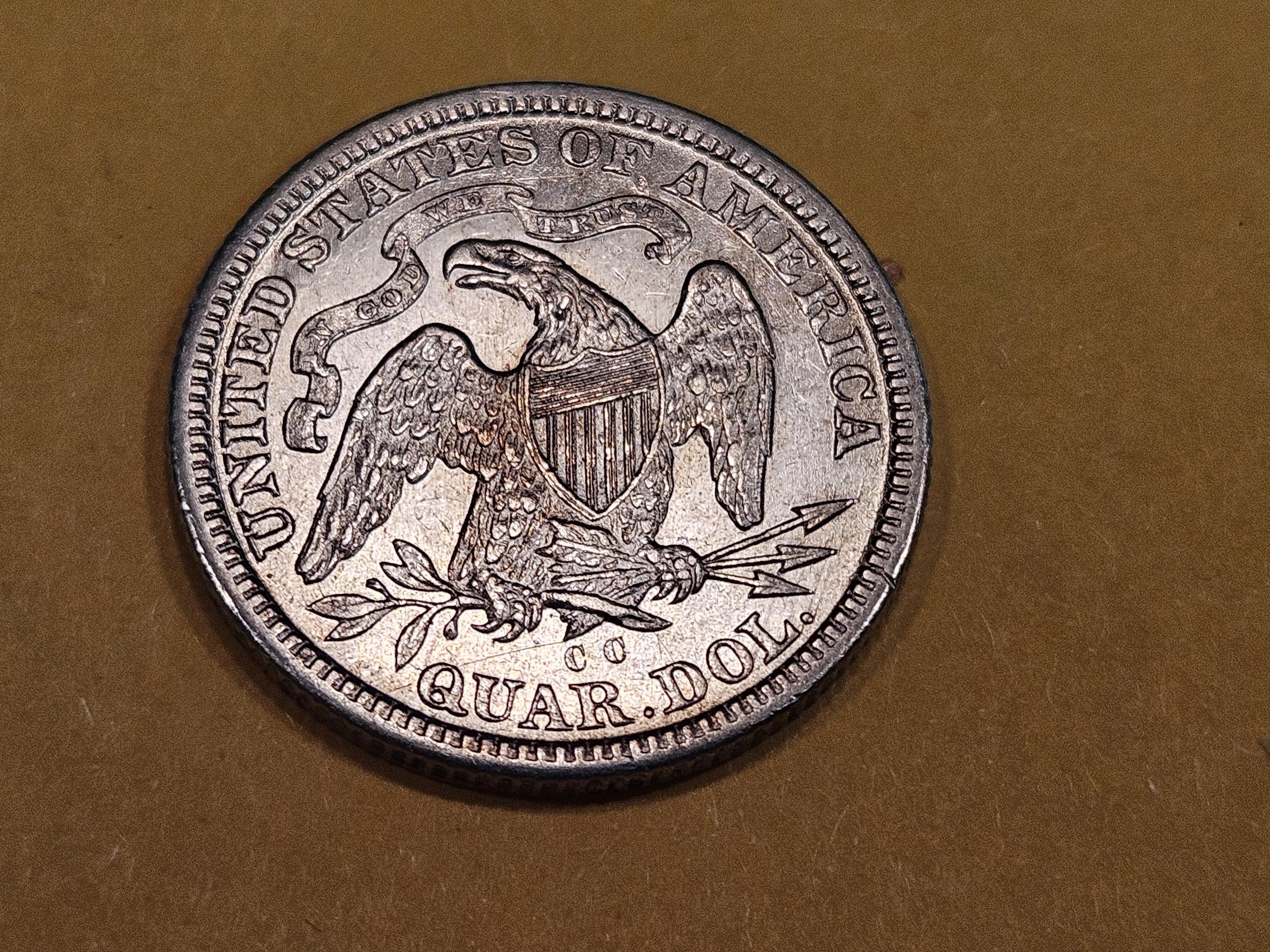 * NICE! 1877-CC Seated Liberty Quarter in Brilliant About Uncirculated - 58