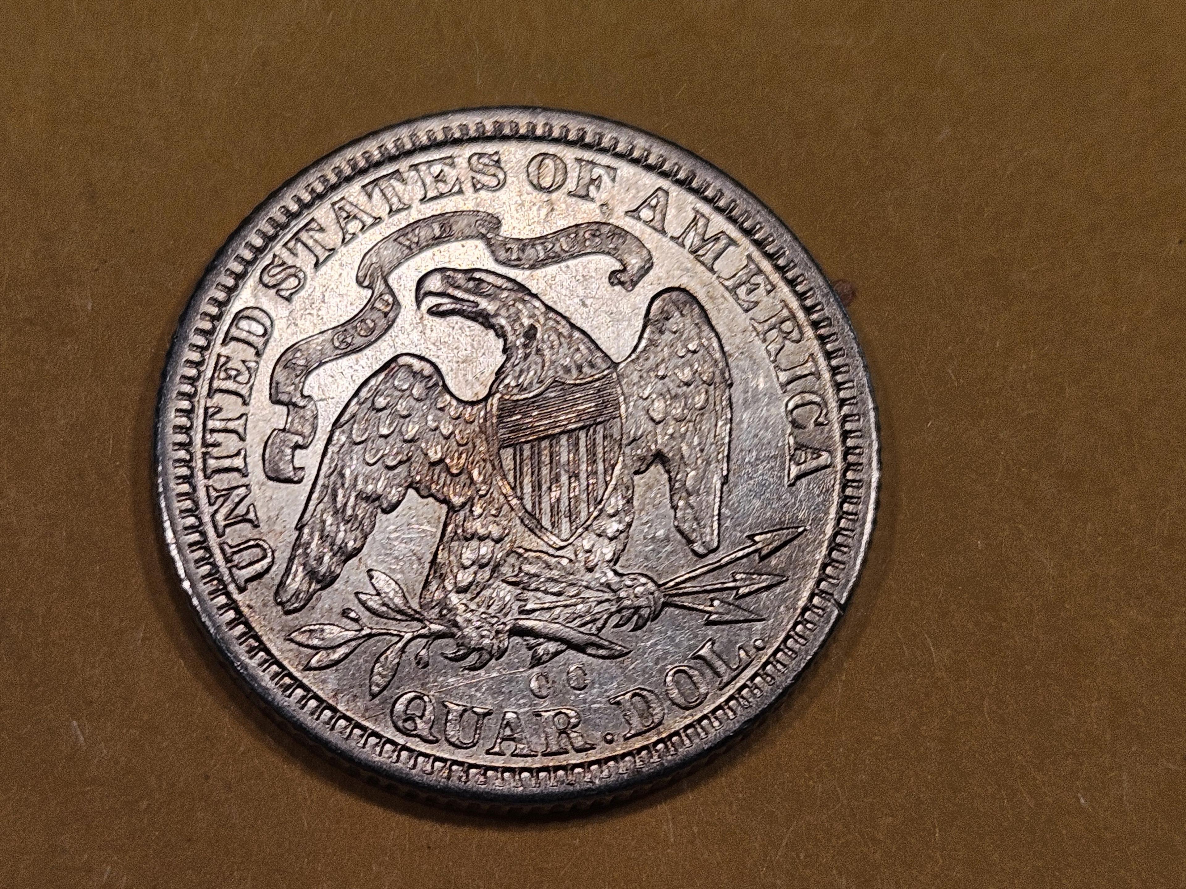 * NICE! 1877-CC Seated Liberty Quarter in Brilliant About Uncirculated - 58