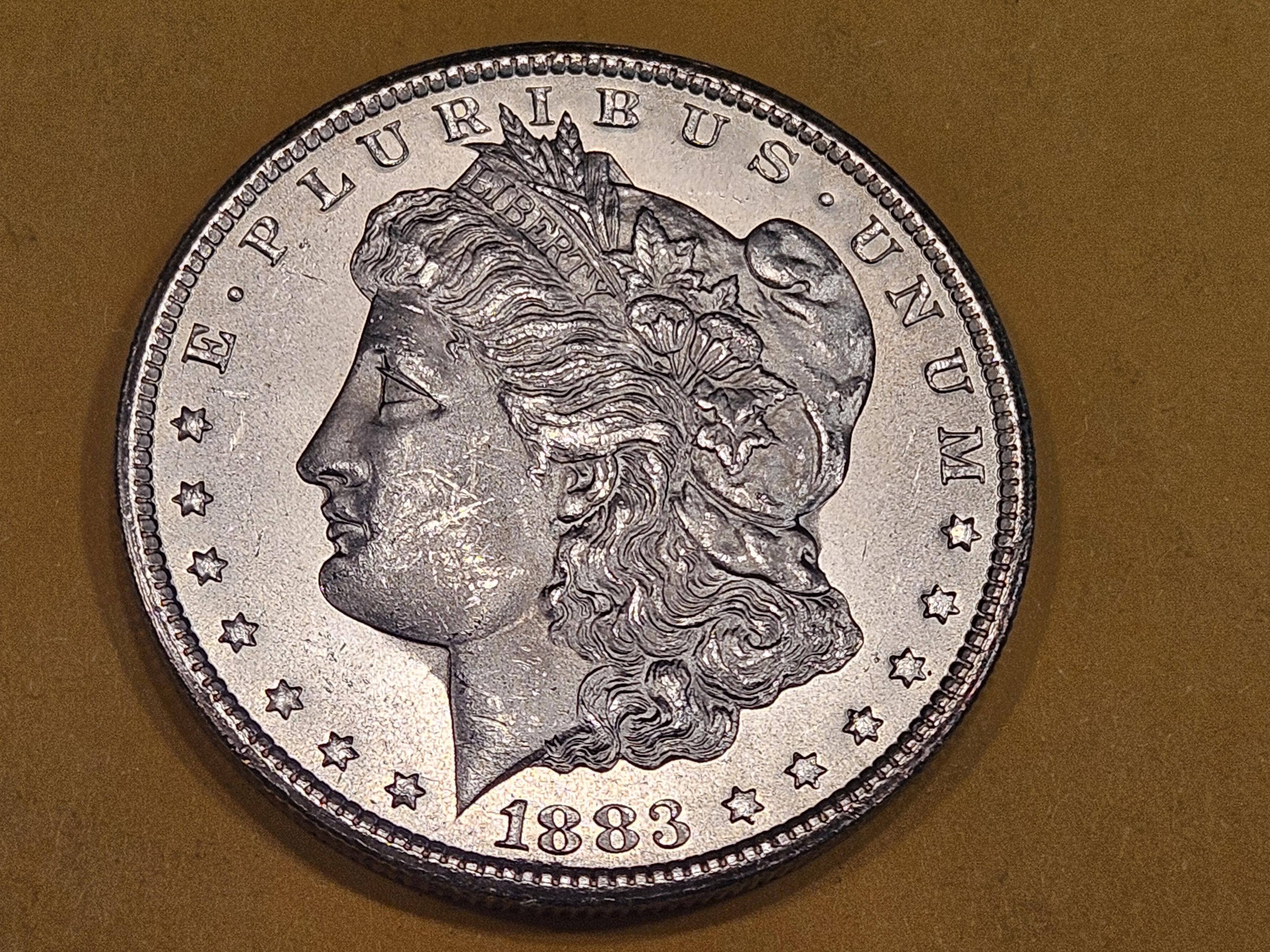 ** KEY DATE ** 1883-CC Morgan Dollar in Very Choice Brilliant Uncirculated