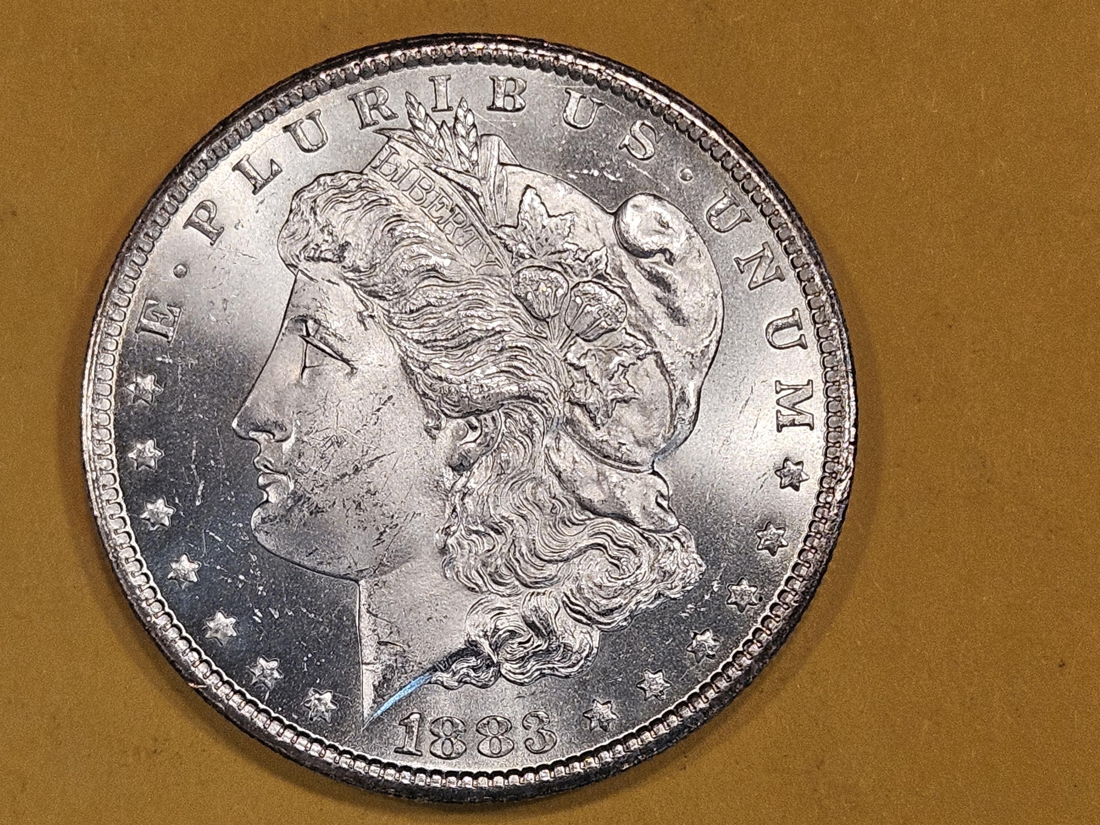 ** KEY DATE ** 1883-CC Morgan Dollar in Very Choice Brilliant Uncirculated