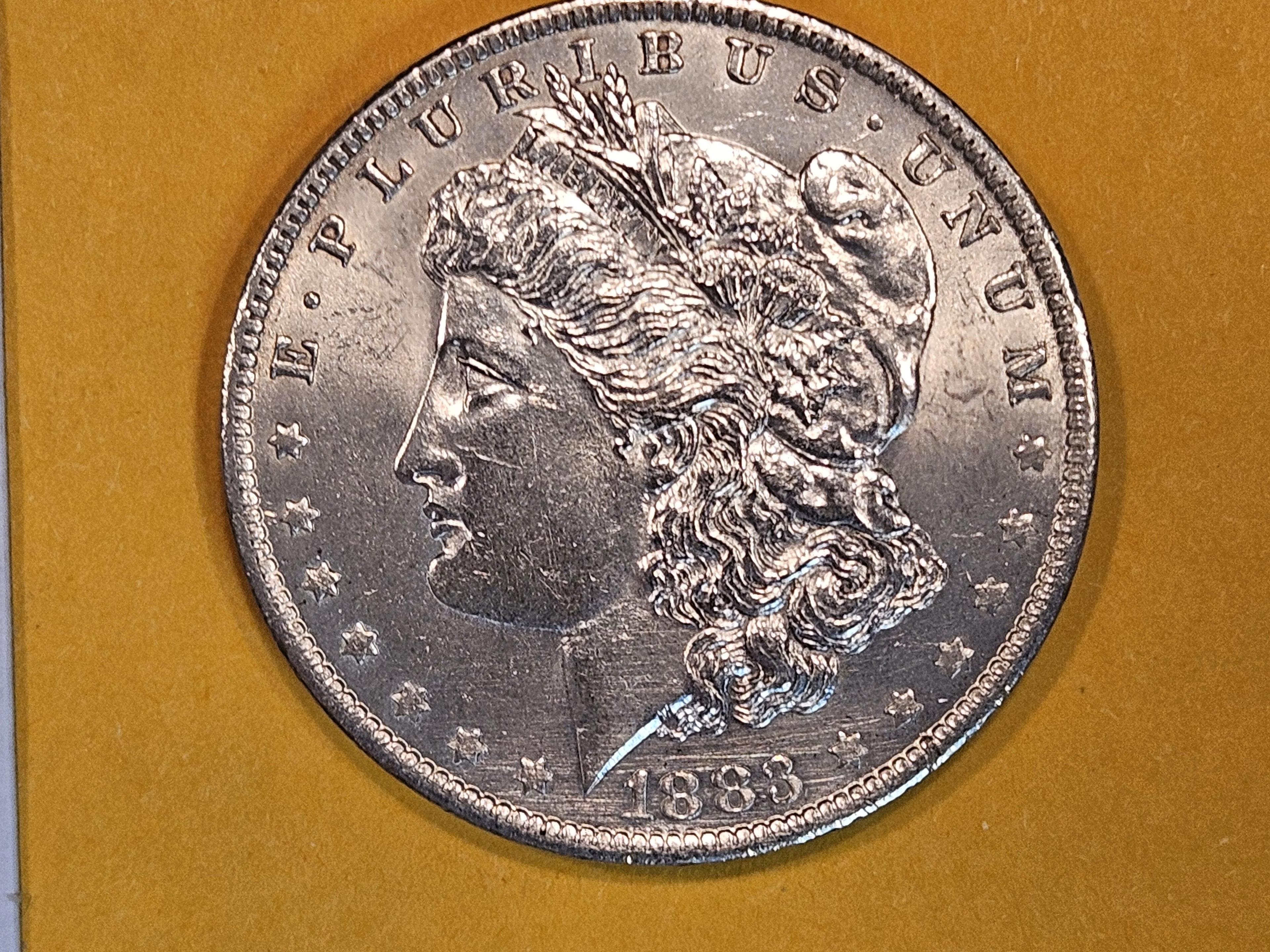 Choice Brilliant Uncirculated + details 1883-O/O Morgan Dollar