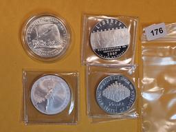 Four mixed Proof Deep Cameo and GEM BU Commemorative Silver Dollars