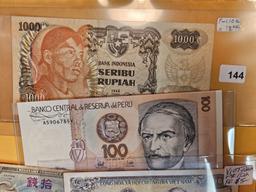 Ten mixed pieces of World Currency