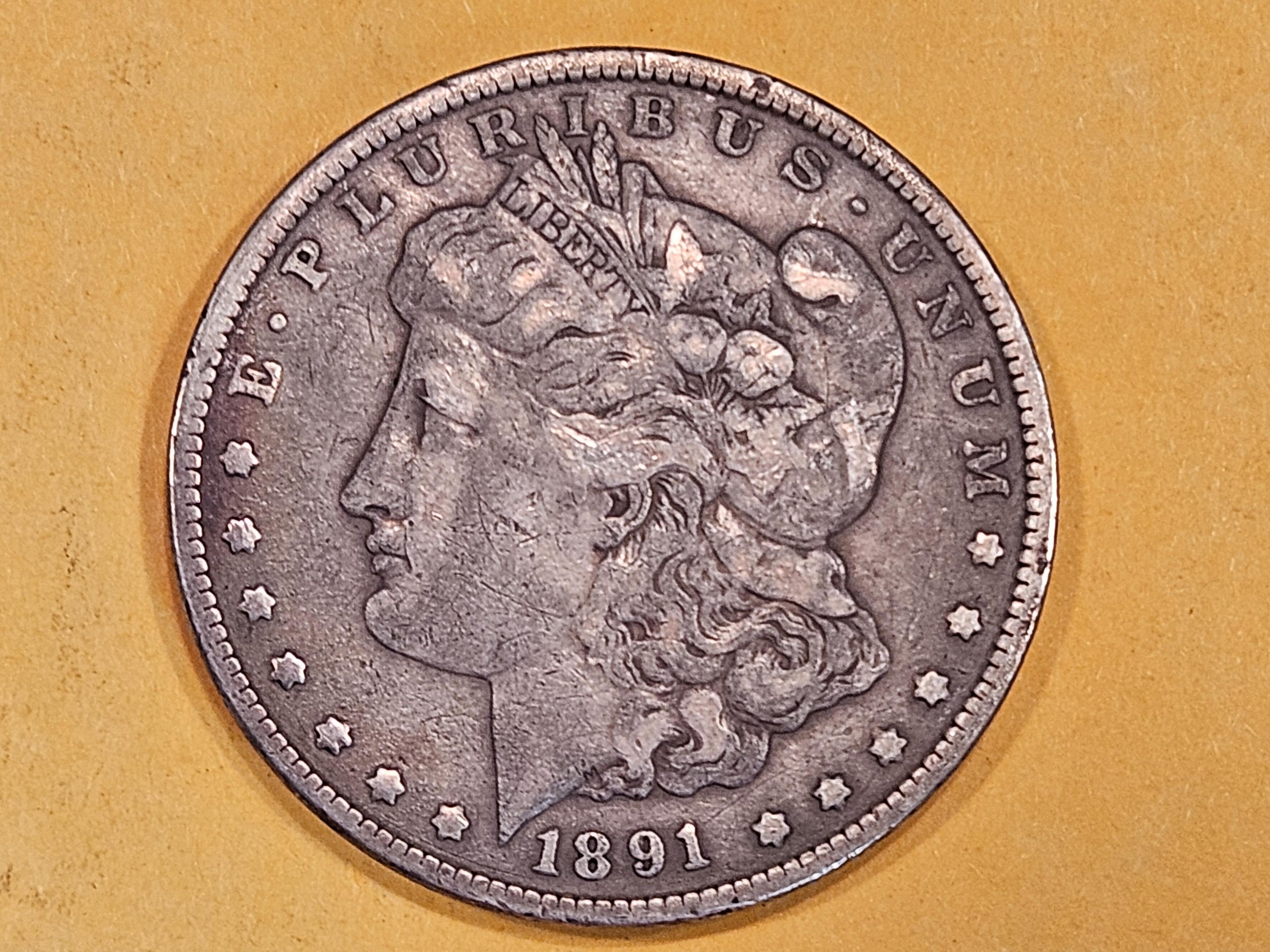 ** KEY DATE ** 1891-CC Morgan Dollar in Fine - 15