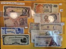 Ten mixed pieces of World Currency
