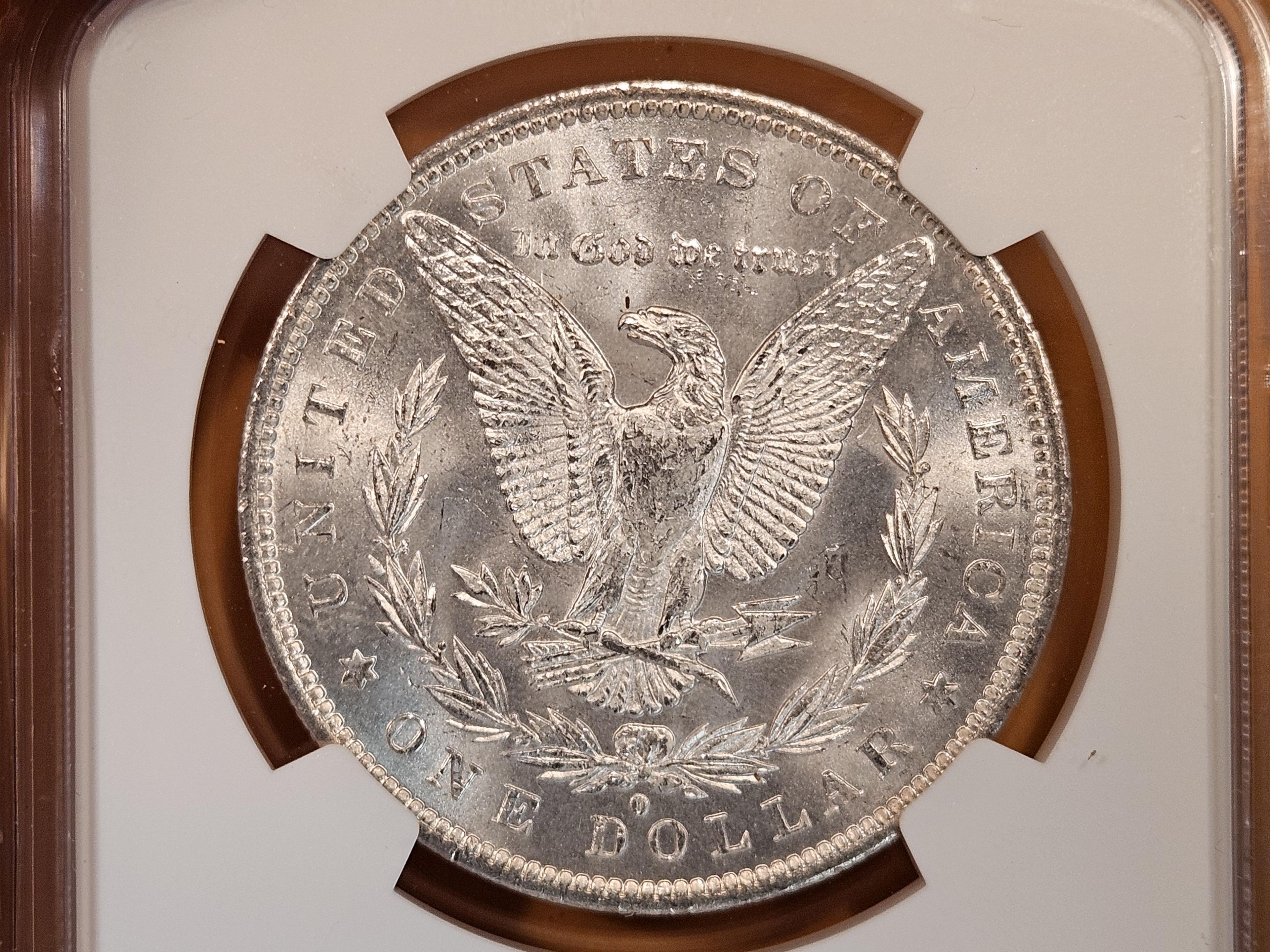 NGC 1883-O Morgan Dollar in Mint State 64