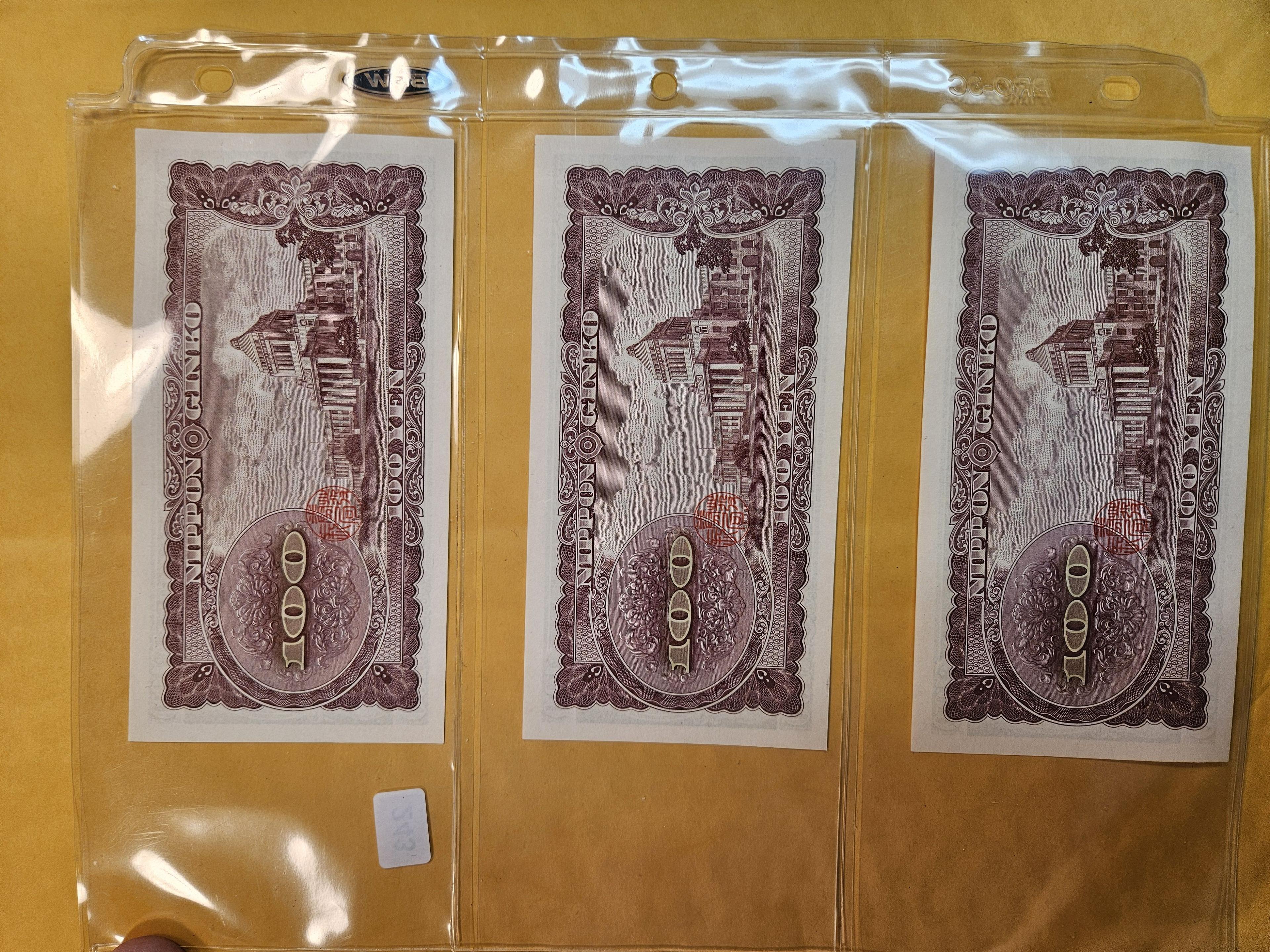 Three crisp uncirculated Japanese notes