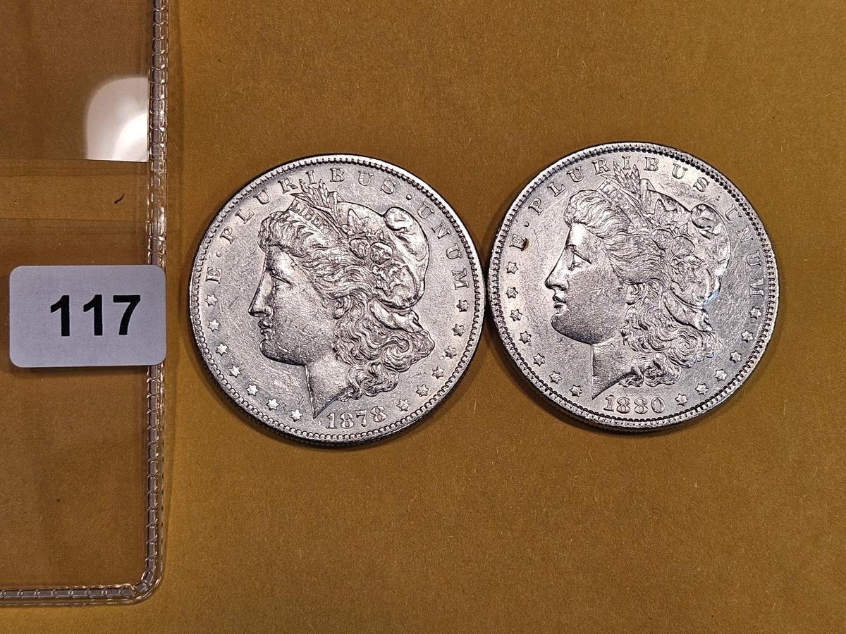 Two About Uncirculated Morgan Dollars