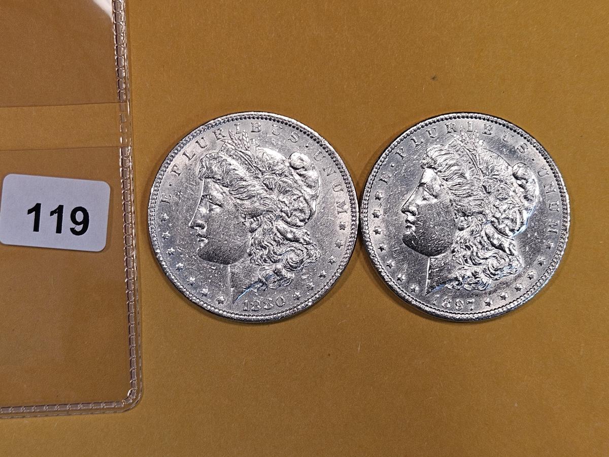 Two About Uncirculated Morgan Dollars