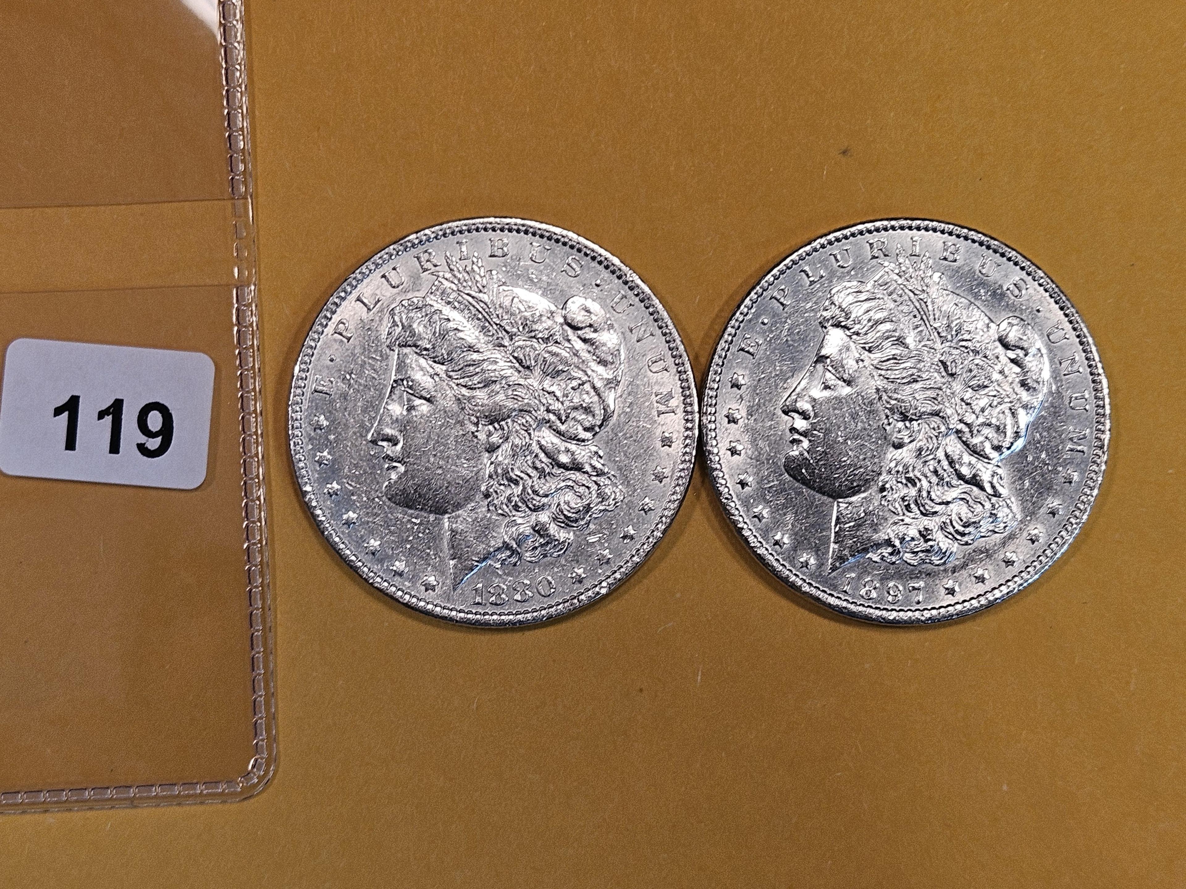 Two About Uncirculated Morgan Dollars