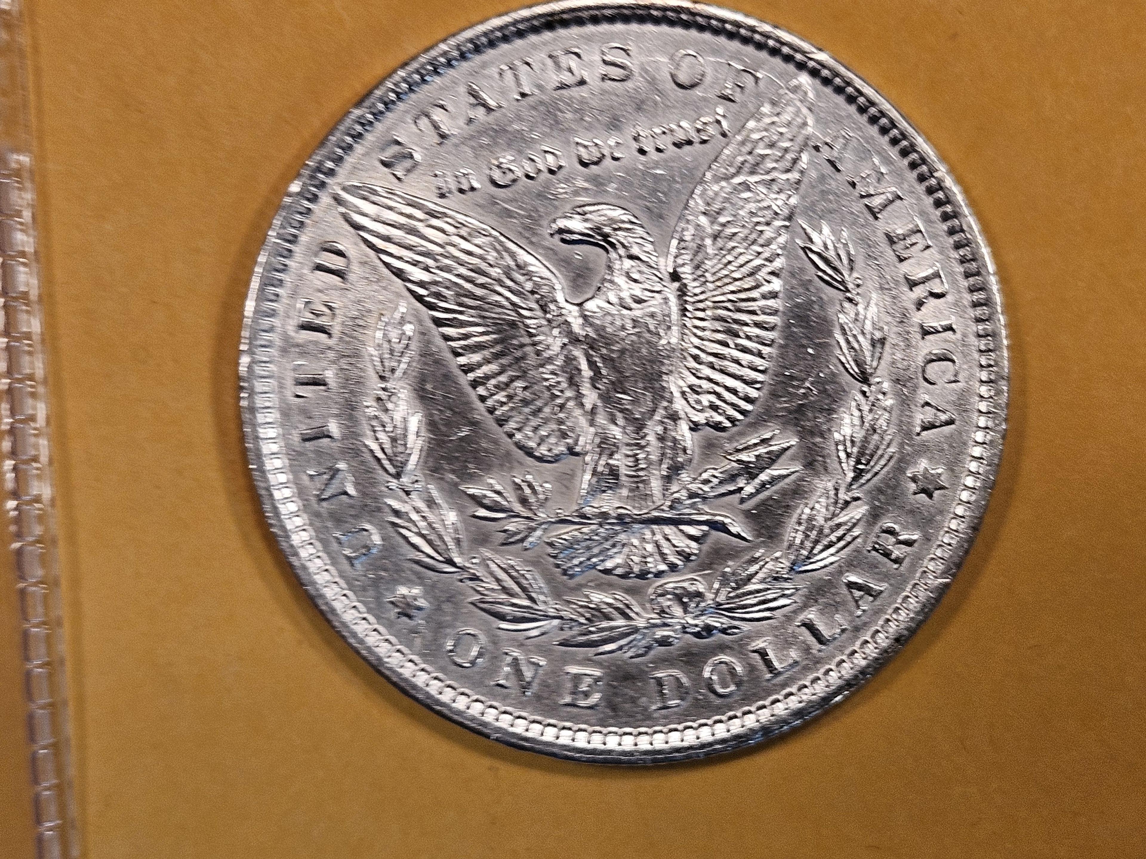 Brilliant About Uncirculated plus 1900 Morgan Dollar