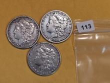 Three mixed Morgan Silver Dollars