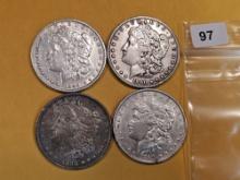 Four mixed Morgan Silver Dollars