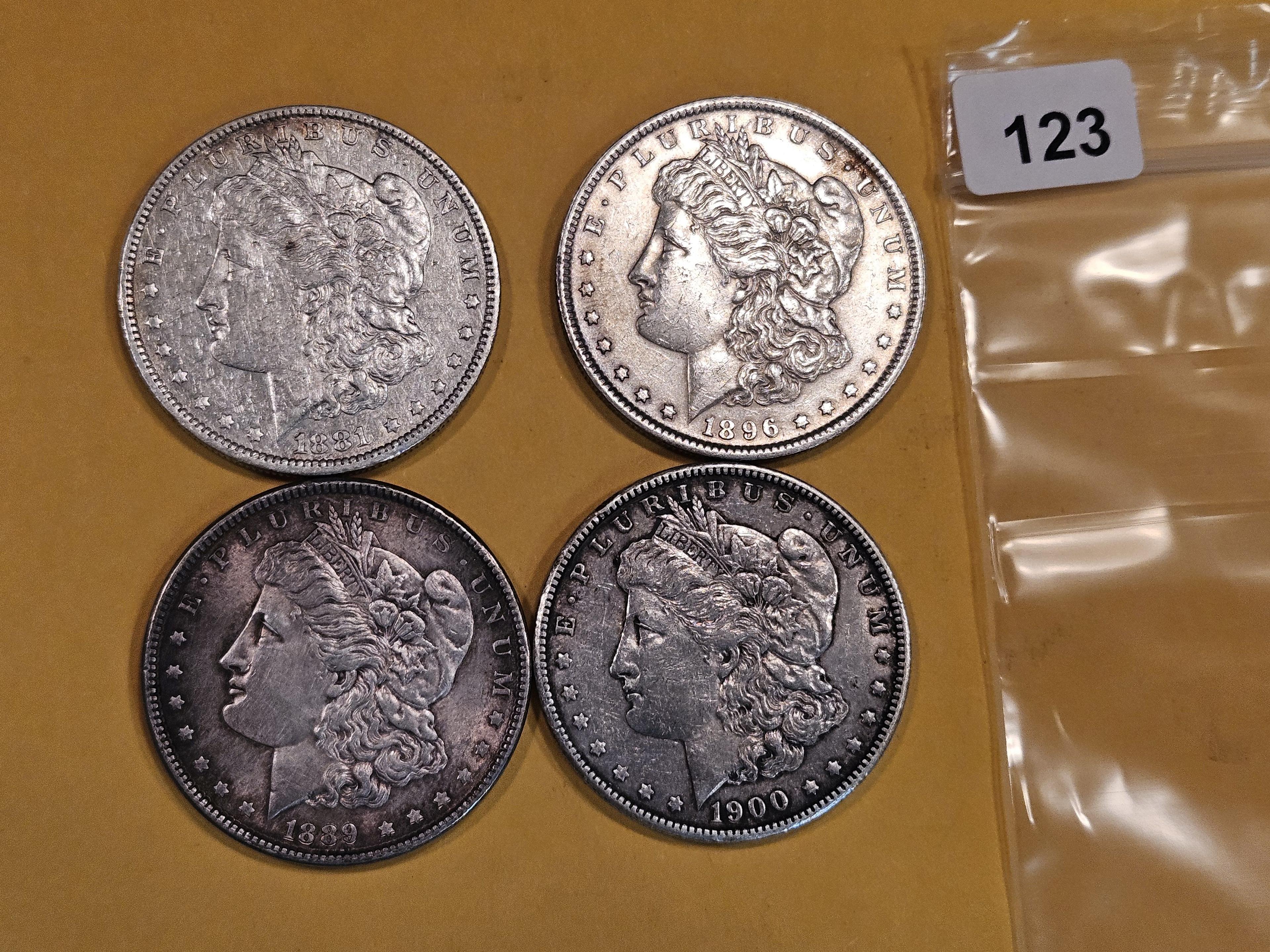 Four Mixed Silver Dollars