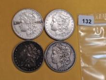 Four Mixed Silver Dollars