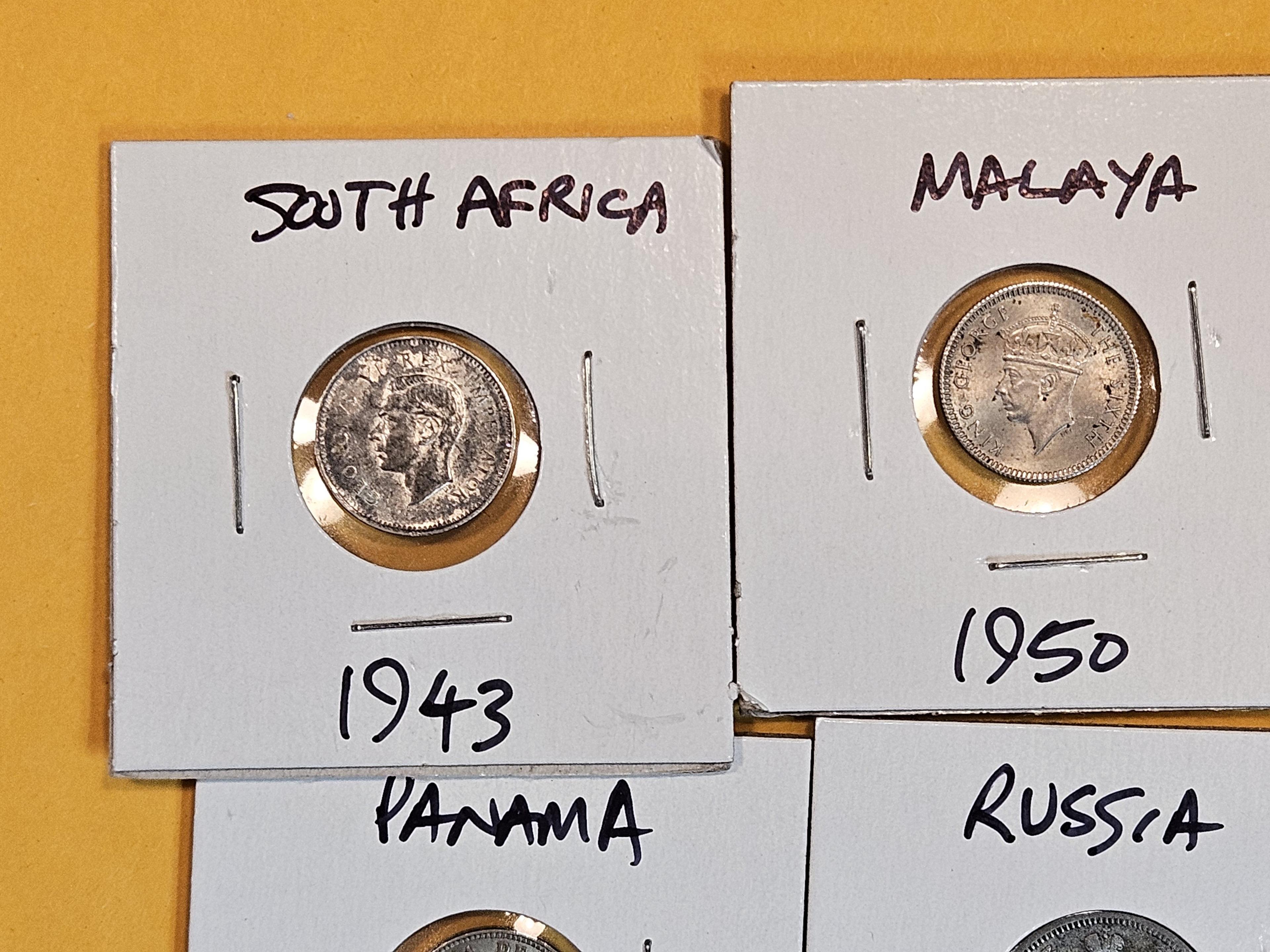 Six Fun small silver World coins