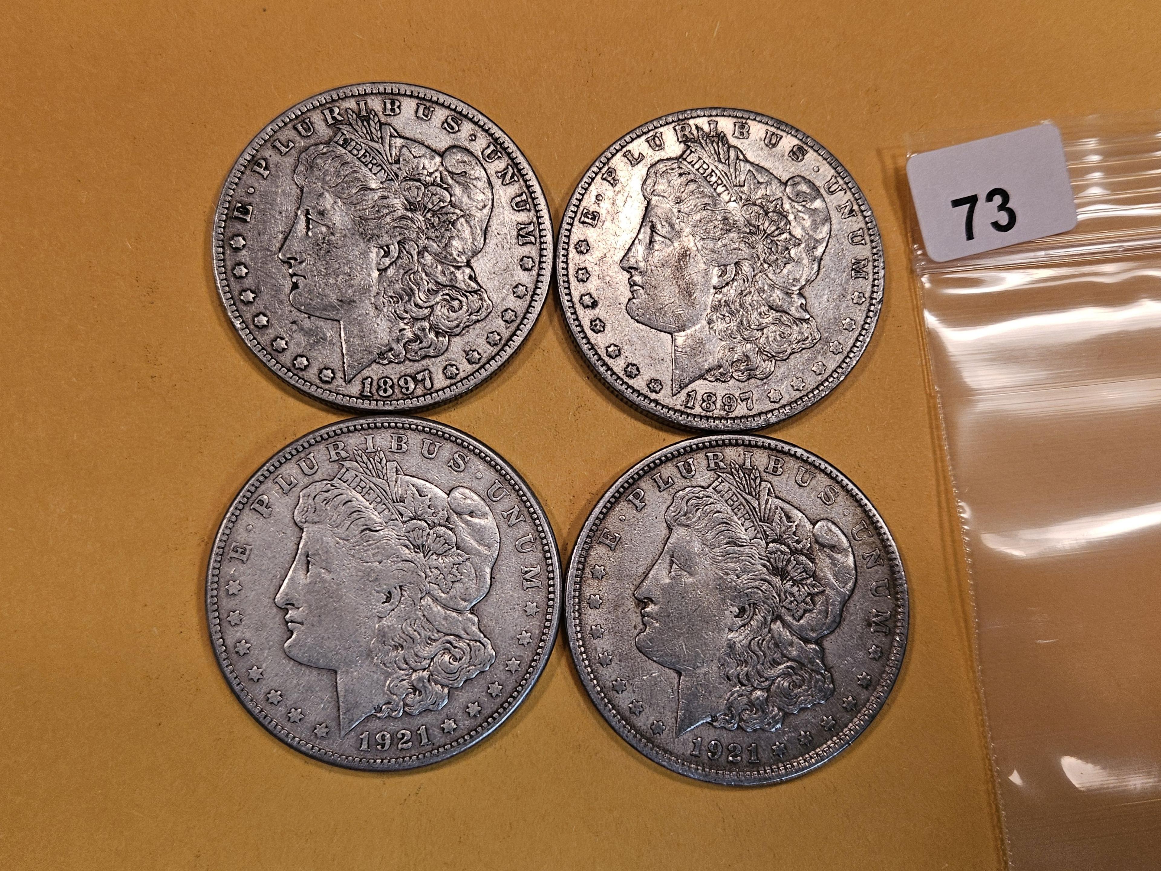 Four mixed Morgan Silver Dollars