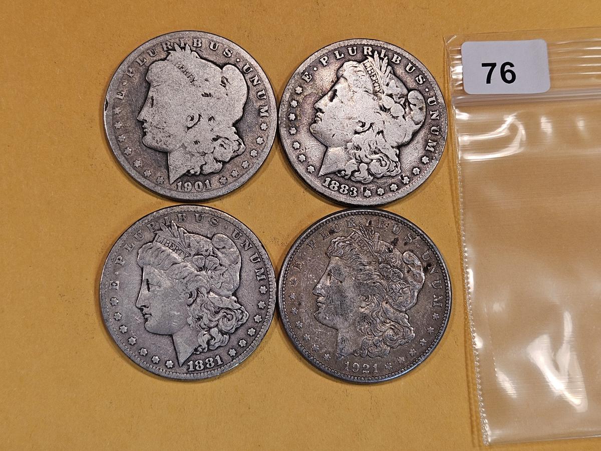 Four mixed Morgan Silver Dollars