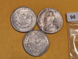 Three mixed Silver Dollars