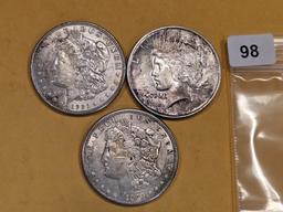 Three mixed Silver Dollars