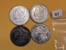 Four mixed Morgan Silver Dollars