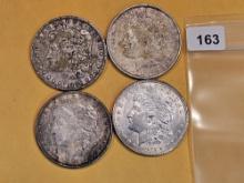 Four mixed Silver Dollars