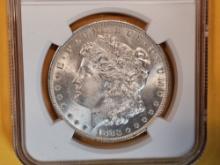 NGC 1883-O Morgan Dollar in Mint State 64