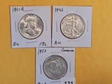 Three different silver half dollars