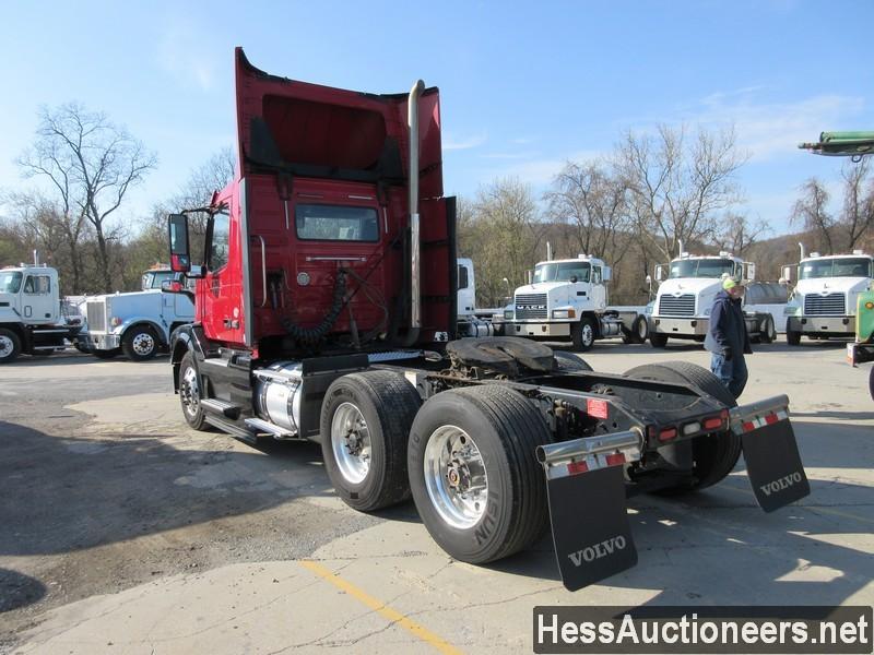 2015 VOLVO VNL62T300 T/A DAYCAB,  6X2 CONFIGURATION, HESS REPORT ATTACHED,