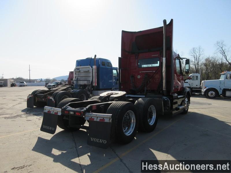 2015 VOLVO VNL62T300 T/A DAYCAB,  6X2 CONFIGURATION, HESS REPORT ATTACHED,