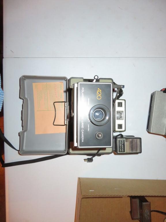 Vintage Polaroid Cameras and Office Items