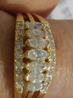 7 Marquise Diamonds Mounted in The Center of a 14k Yellow Gold Band