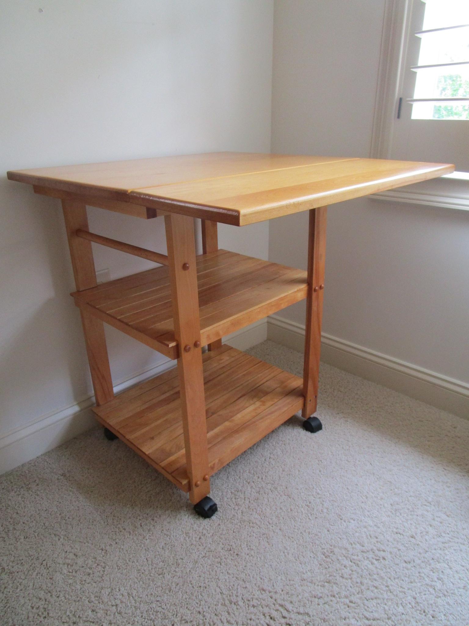 Pine Microwave Stand on Casters 2/One Drop Leaf.  30" T x 27" W x 19" D.