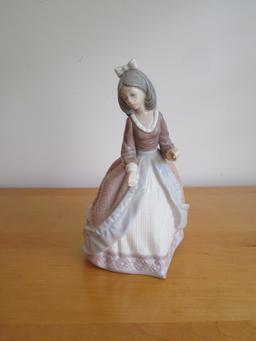 Lladro Porcelain Figurine  7 1/2"  Missing umbrella & hand repaired