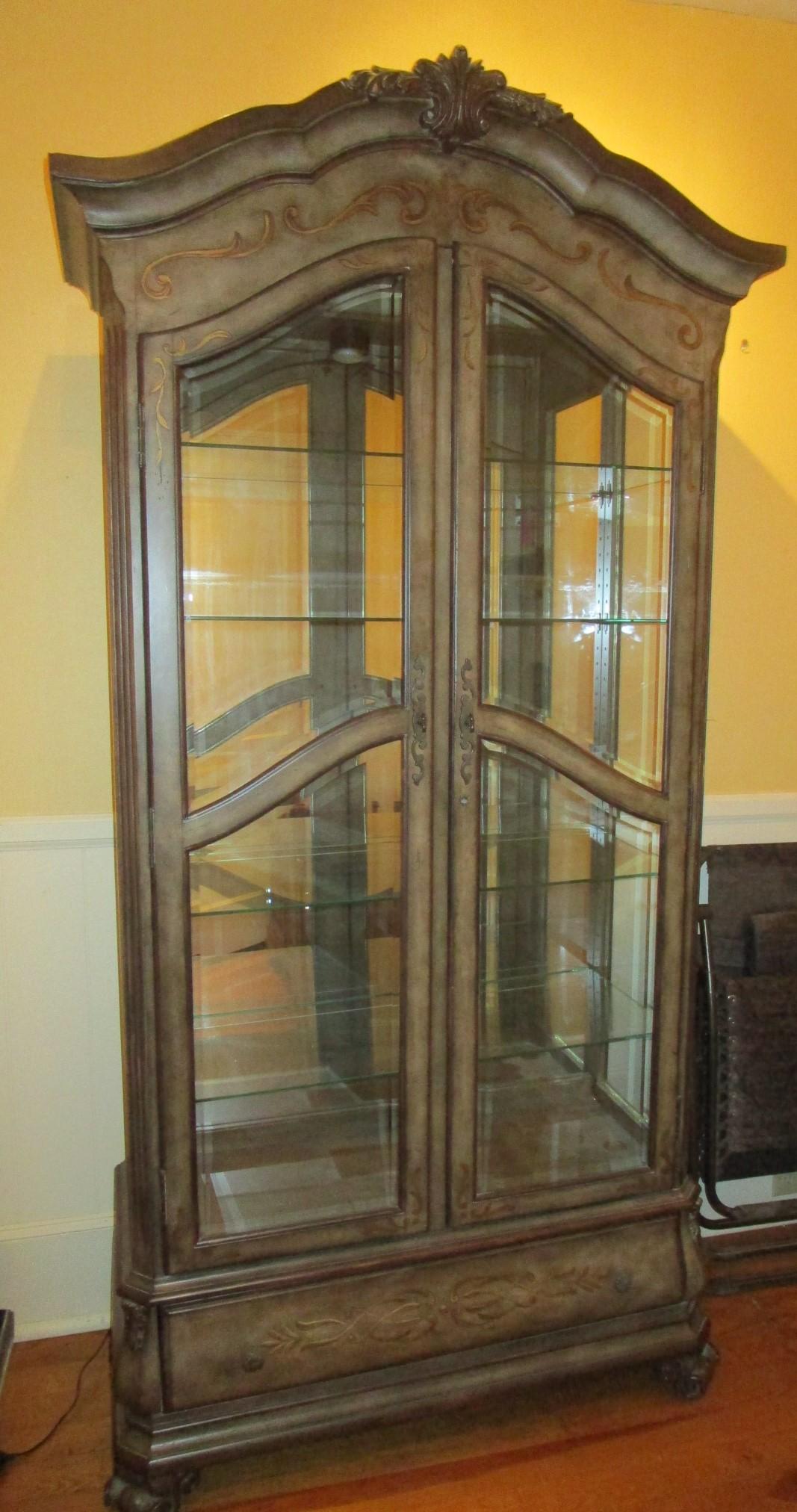 Howard Miller Lighted China/Display Cabinet w/ Glass Shelves & Mirrored Back