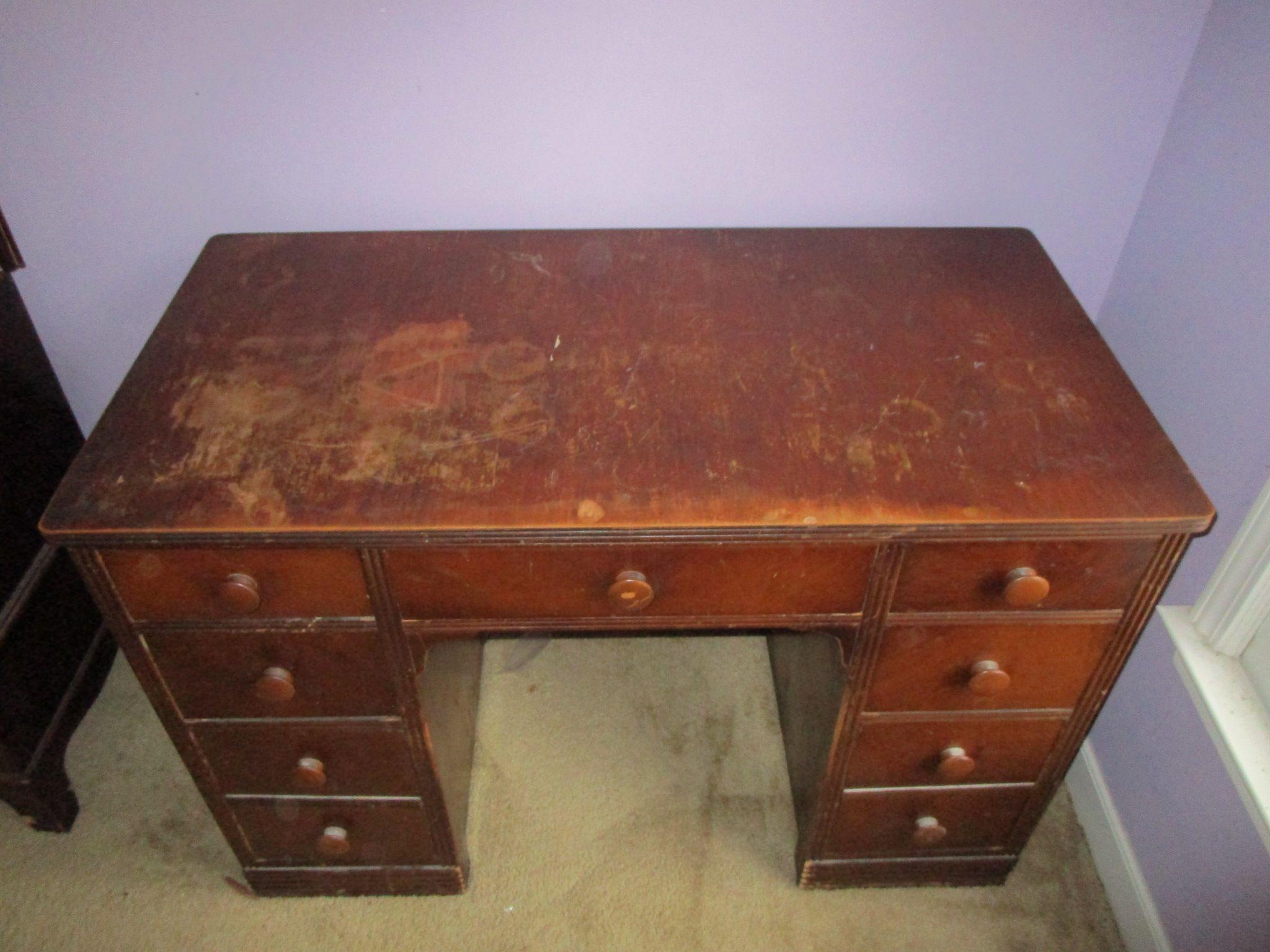 9 Drawer Wooden Kneehole Desk - shows wear - paint project or refinish