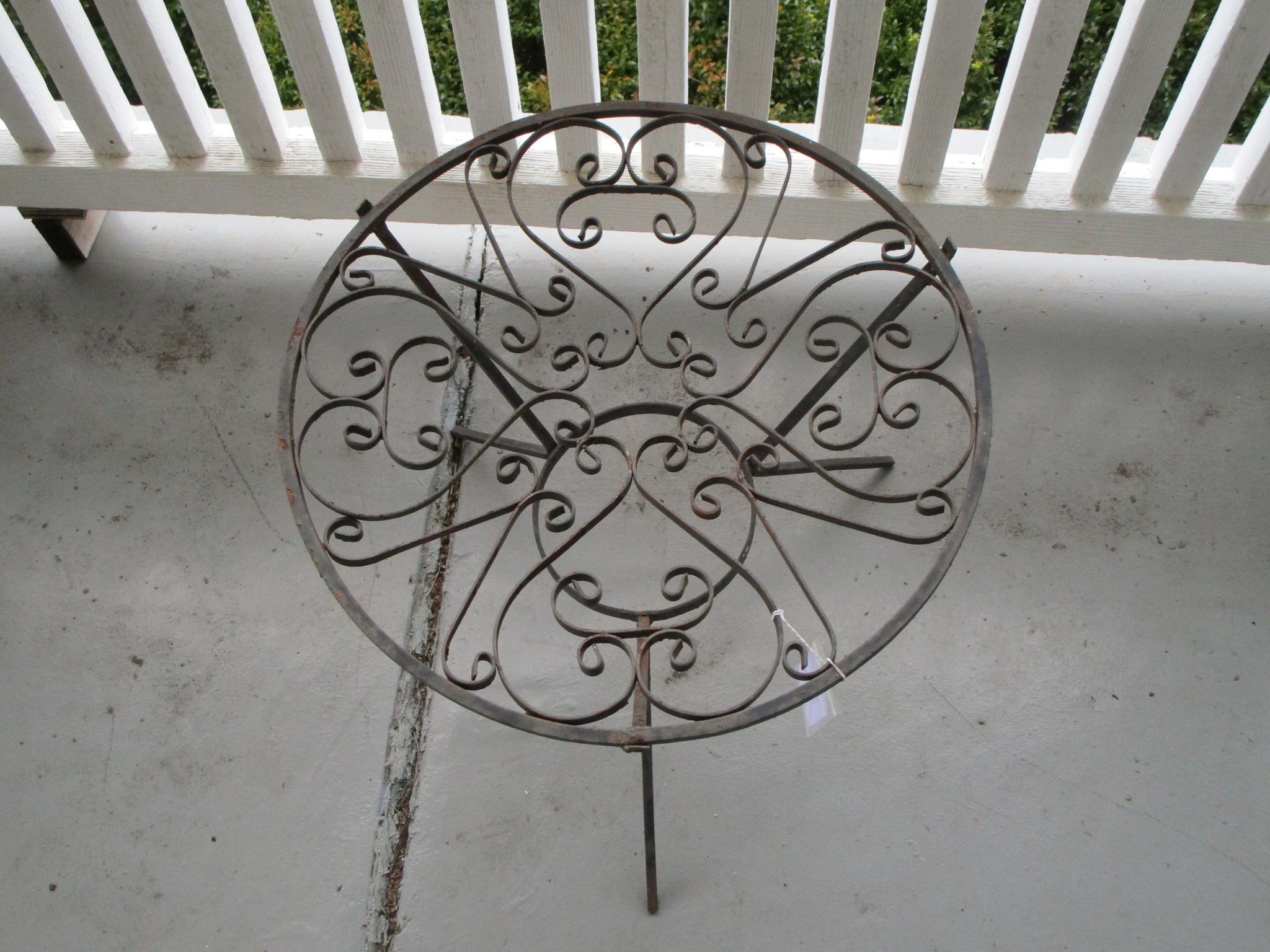 Round Small Wrought Iron Table - Leans a little