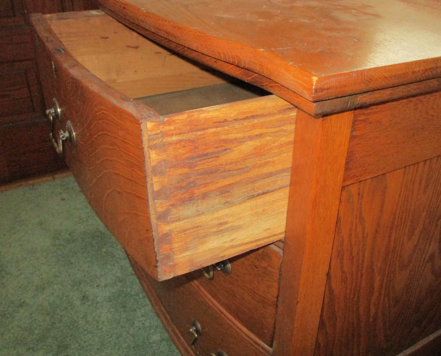 Oak Dresser w/ 2 Drawers over 2 - bottom drawer has a small hole in plywood - Brass Hardware