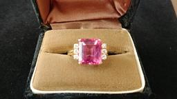 Ladies 14 kt, y/g emerald cut pink tourmaline 12.2mm x 11mm ring with six (6) .04 cut diamonds. Size