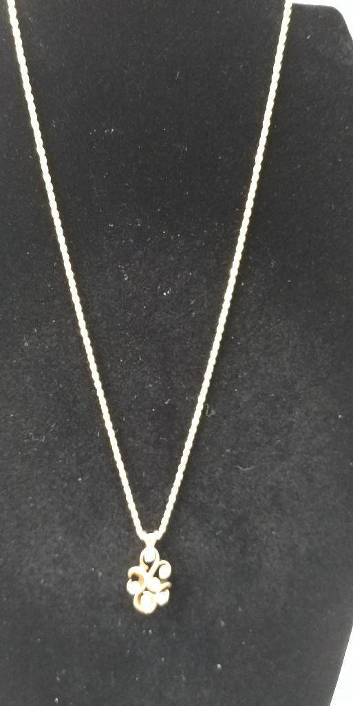 14 kt, y/g six (6) diamond freeform pendant with 18?? 2mm diamond cut chain. Diamond weight .60