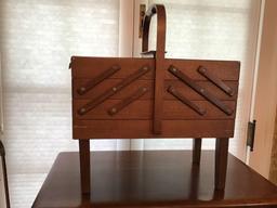 Vintage wooden foldout sewing cabinet