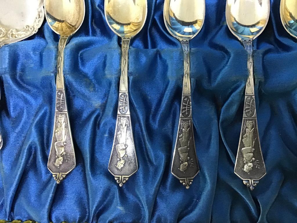 Set sterling silver spoons.  Oriental design in