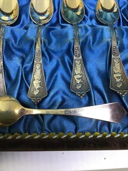 Set sterling silver spoons.  Oriental design in