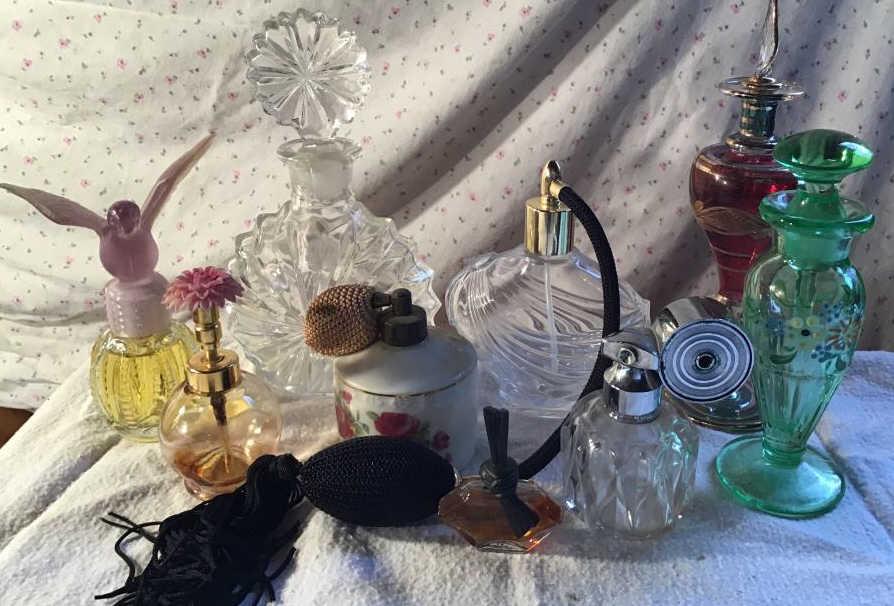 Nine vintage perfume bottles