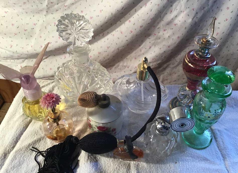 Nine vintage perfume bottles