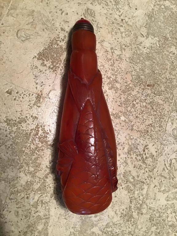 Carved snuff bottle . Fish design.  4 inches