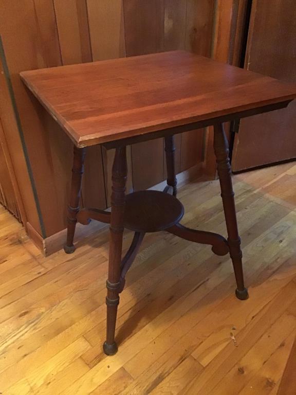 Solid oak parlor table.  23 inch square top, 29